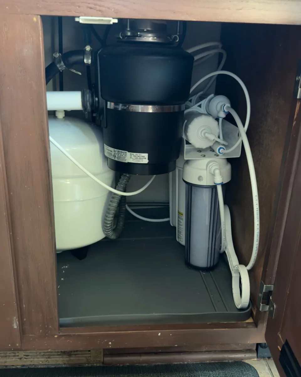 Tank reverse osmosis system with storage tank installed under a kitchen sink by MSP Pure Water