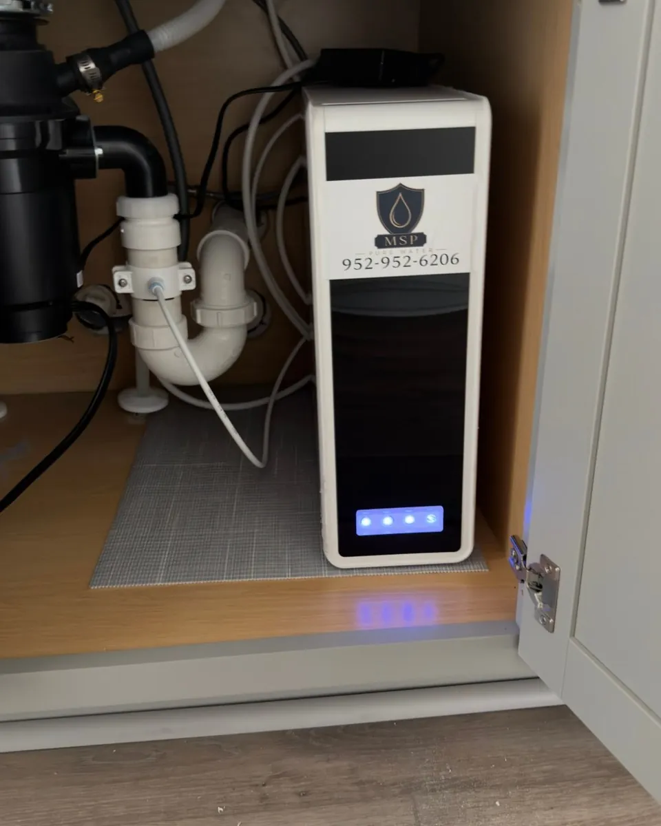 MSP Pure Water tankless reverse osmosis unit installed under a kitchen sink