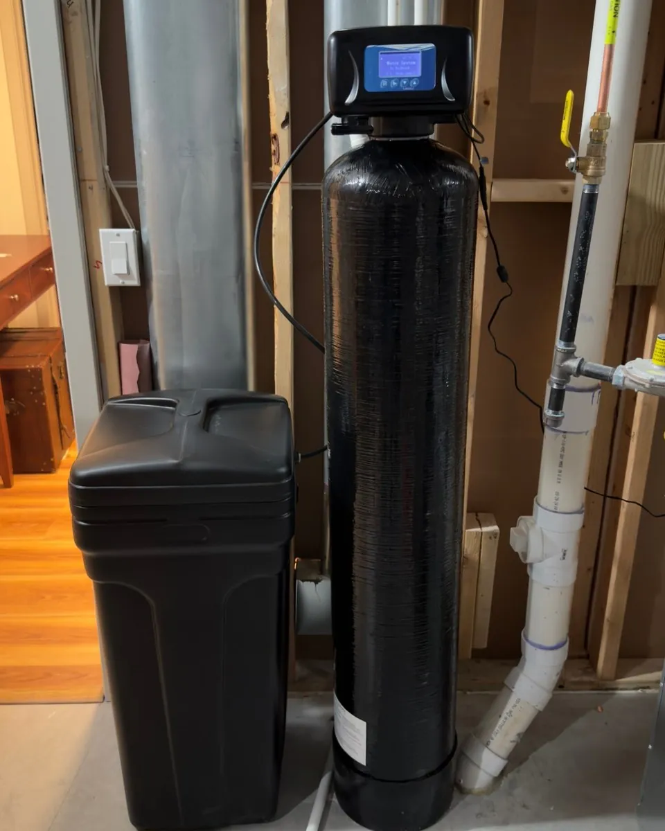 Whole-home water softener with brine tank installed by MSP Pure Water in a Minnesota mechanical room